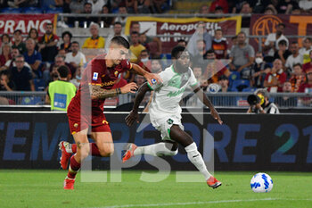 2021-09-12 - Gianluca Mancini of AS Roma and Jeremie Boga of US Sassuolo Calcio in action during the  Italian Football Championship League A 2021/2022 match between AS Roma vs US Sassuolo at the Olimpic Stadium in Rome. - AS ROMA VS US SASSUOLO - ITALIAN SERIE A - SOCCER