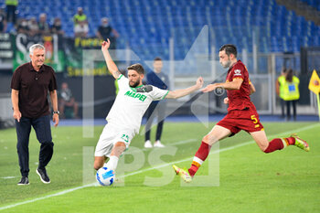 2021-09-12 - Domenico Berardi of Sassuolo Calcio and Matias Vina of AS Roma in action during the  Italian Football Championship League A 2021/2022 match between AS Roma vs US Sassuolo at the Olimpic Stadium in Rome. - AS ROMA VS US SASSUOLO - ITALIAN SERIE A - SOCCER