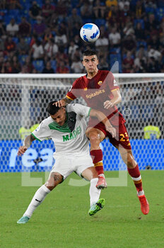 2021-09-12 - Gianluca Scamacca of US Sassuolo Calcio and Gianluca Mancini of AS Roma in action during the  Italian Football Championship League A 2021/2022 match between AS Roma vs US Sassuolo at the Olimpic Stadium in Rome. - AS ROMA VS US SASSUOLO - ITALIAN SERIE A - SOCCER