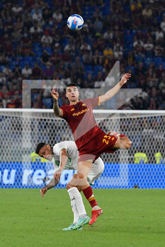 2021-09-12 - Gianluca Scamacca of US Sassuolo Calcio and Gianluca Mancini of AS Roma in action during the  Italian Football Championship League A 2021/2022 match between AS Roma vs US Sassuolo at the Olimpic Stadium in Rome. - AS ROMA VS US SASSUOLO - ITALIAN SERIE A - SOCCER