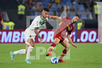 2021-09-12 - Gianluca Scamacca of US Sassuolo Calcio and Bryan Cristante of AS Roma in action during the  Italian Football Championship League A 2021/2022 match between AS Roma vs US Sassuolo at the Olimpic Stadium in Rome. - AS ROMA VS US SASSUOLO - ITALIAN SERIE A - SOCCER