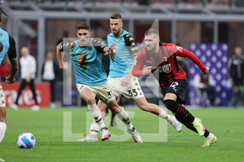 2021-09-22 - Ante Rebic of AC Milan and Mattia Calandra of Venezia FC in action during the Serie A 2021/22 football match between AC Milan and Venezia FC at Giuseppe Meazza Stadium, Milan, Italy on September 22, 2021 - AC MILAN VS VENEZIA FC - ITALIAN SERIE A - SOCCER