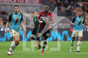 2021-09-22 - Pierre Kalulu of AC Milan and Mattia Calandra of Venezia FC in action during the Serie A 2021/22 football match between AC Milan and Venezia FC at Giuseppe Meazza Stadium, Milan, Italy on September 22, 2021 - AC MILAN VS VENEZIA FC - ITALIAN SERIE A - SOCCER