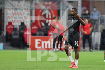 2021-09-22 - Pierre Kalulu of AC Milan warms up during the Serie A 2021/22 football match between AC Milan and Venezia FC at Giuseppe Meazza Stadium, Milan, Italy on September 22, 2021 - AC MILAN VS VENEZIA FC - ITALIAN SERIE A - SOCCER