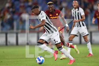 2021-09-23 - ROME, ITALY -  September 23 : Destiny Udogie  of  Udinese in action  during the  Serie A soccer  match between  AS Roma and  Udinese   at Stadio Olimpico on September 23,2021 in Rome Italy - AS ROMA VS UDINESE CALCIO - ITALIAN SERIE A - SOCCER