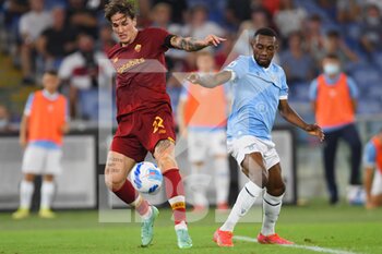 2021-09-26 - ROME, ITALY -  September 26 : Nicolo' Zaniolo  (L) of  AS Roma in action against  Akpa Akpro (R) of SS Lazio during the  Serie A  soccer match between  SS Lazio and AS Roma Stadio Olimpico on September 26,2021  in Rome Italy 

 - SS LAZIO VS AS ROMA - ITALIAN SERIE A - SOCCER