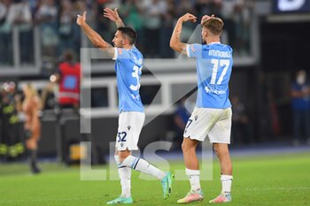 2021-09-26 - ROME, ITALY - September 26 :  Danilo Cataldi at Ciro Immobile SS Lazio Celebrate after the winning during  Italian Serie A soccer match between  SS Lazio and AS Roma at Stadio Olimpico on September 26,2021  in Rome Italy 


 - SS LAZIO VS AS ROMA - ITALIAN SERIE A - SOCCER