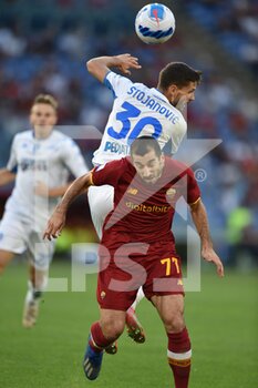 2021-10-03 - ROME, ITALY -  October 3 : Henrikh Mkhitarian (R) of  AS   Roma in action against  Petar Stojanovic  (L) of Empoli FC    during the  Serie A soccer  match between  AS Roma and Empoli FC   at Stadio Olimpico on October 3,2021 in Rome Italy - AS ROMA VS EMPOLI FC - ITALIAN SERIE A - SOCCER