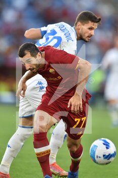 2021-10-03 - ROME, ITALY -  October 3 : Lorenzo Pellegrini (R) of  AS   Roma in action against  Filippo Bandinelli  (L) of Empoli FC    during the  Serie A soccer  match between  AS Roma and Empoli FC   at Stadio Olimpico on October 3,2021 in Rome Italy - AS ROMA VS EMPOLI FC - ITALIAN SERIE A - SOCCER