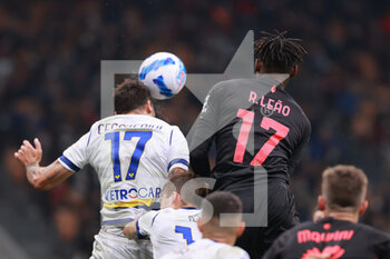 2021-10-16 - Rafael Leao of AC Milan fights for the ball against Federico Ceccherini of Hellas Verona FC during the Serie A 2021/22 football match between AC Milan and Hellas Verona FC at Giuseppe Meazza Stadium, Milan, Italy on October 16, 2021 - AC MILAN VS HELLAS VERONA FC - ITALIAN SERIE A - SOCCER