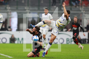 2021-10-16 - Olivier Giroud of AC Milan and Koray Günter of Hellas Verona FC in action during the Serie A 2021/22 football match between AC Milan and Hellas Verona FC at Giuseppe Meazza Stadium, Milan, Italy on October 16, 2021 - AC MILAN VS HELLAS VERONA FC - ITALIAN SERIE A - SOCCER