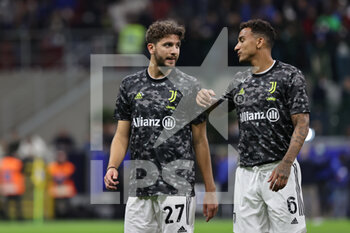 2021-10-24 - Manuel Locatelli of Juventus FC talks to Danilo of Juventus FC during the Serie A 2021/22 football match between FC Internazionale and Juventus FC at Giuseppe Meazza Stadium, Milan, Italy on October 24, 2021 - INTER - FC INTERNAZIONALE VS JUVENTUS FC - ITALIAN SERIE A - SOCCER