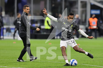 2021-10-24 - Alex Sandro of Juventus FC warms up during the Serie A 2021/22 football match between FC Internazionale and Juventus FC at Giuseppe Meazza Stadium, Milan, Italy on October 24, 2021 - INTER - FC INTERNAZIONALE VS JUVENTUS FC - ITALIAN SERIE A - SOCCER