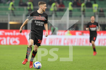 2021-10-26 - Alexis Saelemaekers of AC Milan in action during the Serie A 2021/22 football match between AC Milan and Torino FC at Giuseppe Meazza Stadium, Milan, Italy on October 26, 2021 - AC MILAN VS TORINO FC - ITALIAN SERIE A - SOCCER