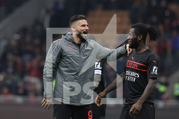 2021-10-26 - Olivier Giroud of AC Milan celebrates the victory at the end of the match with Franck Kessie of AC Milan during the Serie A 2021/22 football match between AC Milan and Torino FC at Giuseppe Meazza Stadium, Milan, Italy on October 26, 2021 - AC MILAN VS TORINO FC - ITALIAN SERIE A - SOCCER
