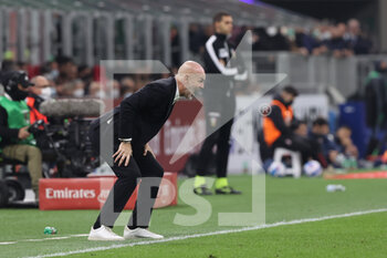 2021-10-26 - Stefano Pioli Head Coach of AC Milan reacts from the bench during the Serie A 2021/22 football match between AC Milan and Torino FC at Giuseppe Meazza Stadium, Milan, Italy on October 26, 2021 - AC MILAN VS TORINO FC - ITALIAN SERIE A - SOCCER