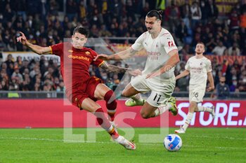 2021-10-31 - Roger Ibanez (AS Roma) Zlatan Ibrahimovic (AC Milan)  during the  Italian Football Championship League A 2021/2022 match between AS Roma vs AC Milan at the Olimpic Stadium in Rome  on 31 October  2021. - AS ROMA VS AC MILAN - ITALIAN SERIE A - SOCCER