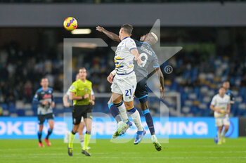 2021-11-07 - Koray Gunter (21) Hellas Verona
 heads the ball as fighting with Victor Osimhen (9) SSC Napoli 1926 during the Italian soccer Serie A 2021/2022 match SSC Napoli vs Hellas Verona on November 7, 2021 at the Stadium Diego Armando Maradona in Naples, Italy - SSC NAPOLI VS HELLAS VERONA FC - ITALIAN SERIE A - SOCCER