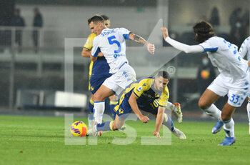 2021-11-22 - leo stlac (empoli) and gianluca caprri (verona) - HELLAS VERONA FC VS EMPOLI FC - ITALIAN SERIE A - SOCCER