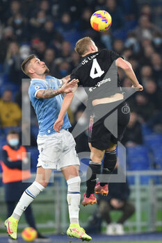 2021-11-20 - ROME, ITALY -  November 20 :  Serjei Milinkovic  (L) of  SS Lazio in action against  Matthijs De Ligt (R) of  FC Juventus during the  Serie A  soccer match between  SS Lazio and FC Juventus Stadio Olimpico on October 27,2021 in Rome, Italy - SS LAZIO VS JUVENTUS FC - ITALIAN SERIE A - SOCCER