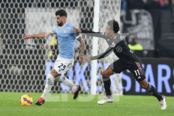 2021-11-20 - ROME, ITALY -  November 20 :  Elseid Hysaj  (L) of  SS Lazio in action against  Juan Guillermo Cuadrado (R) of  FC Juventus during the  Serie A  soccer match between  SS Lazio and FC Juventus Stadio Olimpico on October 27,2021 in Rome, Italy - SS LAZIO VS JUVENTUS FC - ITALIAN SERIE A - SOCCER