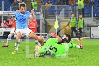 2021-11-20 - ROME, ITALY - November 20 : Goalkeeper Jose’ Manuel Reina of SS Lazio commits a penalty foul on  Federico Chiesa Juventus FC  Italian Serie A soccer match  between  SS Lazio and FC Juventus Stadio Olimpico on November 20,2021 in Rome Italy - SS LAZIO VS JUVENTUS FC - ITALIAN SERIE A - SOCCER