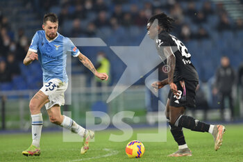 2021-11-20 - ROME, ITALY -  November 20 :  Moise Kean  (L) of  FC Juventus in action against  Francesco Acerbi (R) of SS Lazio during the  Serie A  soccer match between  SS Lazio and FC Juventus Stadio Olimpico on November 20,2021 in Rome Italy  - SS LAZIO VS JUVENTUS FC - ITALIAN SERIE A - SOCCER
