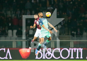 2021-11-22 - Bremer (Torino Fc) and Mato Jajalo of Udinese Calcio during the Italian Serie A football match between Torino FC and Udinese Calcio at Stadio Grande Torino, Torino, Italy - TORINO FC VS UDINESE CALCIO - ITALIAN SERIE A - SOCCER