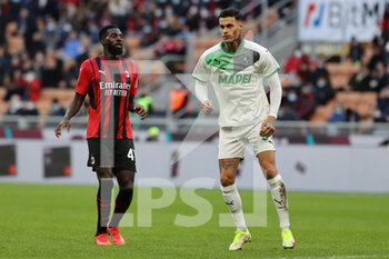 2021-11-28 - Gianluca Scamacca of US Sassuolo celebrates after scoring a goal during the Serie A 2021/22 football match between AC Milan and US Sassuolo at Giuseppe Meazza Stadium, Milan, Italy on November 28, 2021 - AC MILAN VS US SASSUOLO - ITALIAN SERIE A - SOCCER