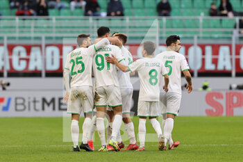 2021-11-28 - Gianluca Scamacca of US Sassuolo celebrates with his teammates after scoring a goal during the Serie A 2021/22 football match between AC Milan and US Sassuolo at Giuseppe Meazza Stadium, Milan, Italy on November 28, 2021 - AC MILAN VS US SASSUOLO - ITALIAN SERIE A - SOCCER