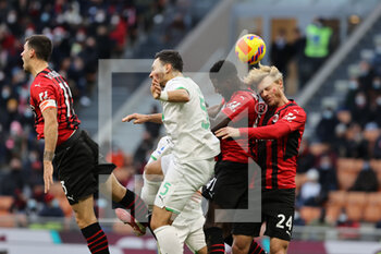 2021-11-28 - Domenico Berardi of US Sassuolo, Tiemoue Bakayoko of AC Milan and Simon Kjaer of AC Milan in action during the Serie A 2021/22 football match between AC Milan and US Sassuolo at Giuseppe Meazza Stadium, Milan, Italy on November 28, 2021 - AC MILAN VS US SASSUOLO - ITALIAN SERIE A - SOCCER