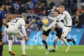 2021-12-01 - Joaquin Correa of FC Internazionale fights for the ball against Viktor Kovalenko of Spezia Calcio during the Serie A 2021/22 football match between FC Internazionale and Spezia Calcio at Giuseppe Meazza Stadium, Milan, Italy on December 01, 2021 - INTER - FC INTERNAZIONALE VS SPEZIA CALCIO - ITALIAN SERIE A - SOCCER
