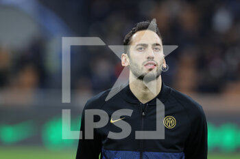 2021-12-01 - Hakan Calhanoglu of FC Internazionale looks on during the Serie A 2021/22 football match between FC Internazionale and Spezia Calcio at Giuseppe Meazza Stadium, Milan, Italy on December 01, 2021 - INTER - FC INTERNAZIONALE VS SPEZIA CALCIO - ITALIAN SERIE A - SOCCER
