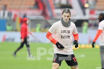 2021-12-04 - Alessio Romagnoli of AC Milan warms up during the Serie A 2021/22 football match between AC Milan and US Salernitana 1919 at Giuseppe Meazza Stadium, Milan, Italy on December 04, 2021 - AC MILAN VS US SALERNITANA - ITALIAN SERIE A - SOCCER