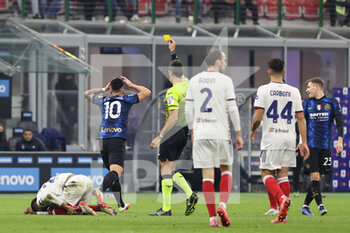 2021-12-12 - Lautaro Martinez of FC Internazionale yellow card during the Serie A 2021/22 football match between FC Internazionale and Cagliari Calcio at Giuseppe Meazza Stadium, Milan, Italy on December 12, 2021 - INTER - FC INTERNAZIONALE VS CAGLIARI CALCIO - ITALIAN SERIE A - SOCCER