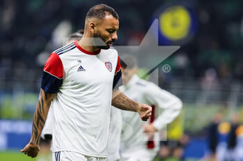 2021-12-12 - Joao Pedro of Cagliari Calcio warms up during the Serie A 2021/22 football match between FC Internazionale and Cagliari Calcio at Giuseppe Meazza Stadium, Milan, Italy on December 12, 2021 - INTER - FC INTERNAZIONALE VS CAGLIARI CALCIO - ITALIAN SERIE A - SOCCER