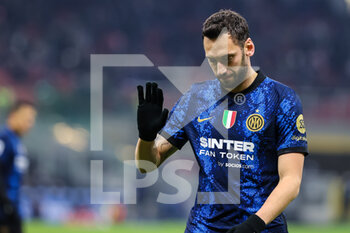 2021-12-12 - Hakan Calhanoglu of FC Internazionale reacts during the Serie A 2021/22 football match between FC Internazionale and Cagliari Calcio at Giuseppe Meazza Stadium, Milan, Italy on December 12, 2021 - INTER - FC INTERNAZIONALE VS CAGLIARI CALCIO - ITALIAN SERIE A - SOCCER