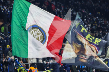 2021-12-12 - A fan waves a giant flag during the Serie A 2021/22 football match between FC Internazionale and Cagliari Calcio at Giuseppe Meazza Stadium, Milan, Italy on December 12, 2021 - INTER - FC INTERNAZIONALE VS CAGLIARI CALCIO - ITALIAN SERIE A - SOCCER
