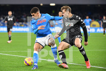 2021-12-12 - Napoli's defender Giovanni Di Lorenzo compete for the ball with Empoli's midfielder Szymon Zurkowski  - SSC NAPOLI VS EMPOLI FC - ITALIAN SERIE A - SOCCER