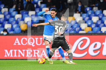 2021-12-12 - Napoli's midfielder Eljif Elmas compete for the ball with Empoli's defender Petar Stojanovic  - SSC NAPOLI VS EMPOLI FC - ITALIAN SERIE A - SOCCER