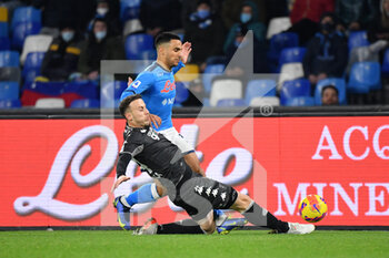2021-12-12 - Napoli's forward Adam Ounas compete for the ball with Empoli's defender Ardian Ismajli  - SSC NAPOLI VS EMPOLI FC - ITALIAN SERIE A - SOCCER