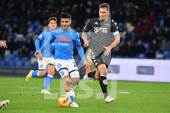 2021-12-12 - Napoli's forward Lorenzo Insigne and Empoli's midfielder Leo Stulac in action  - SSC NAPOLI VS EMPOLI FC - ITALIAN SERIE A - SOCCER