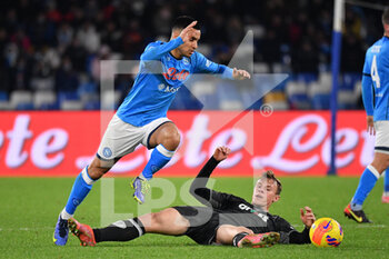 2021-12-12 - Napoli's forward Adam Ounas and Empoli's midfielder Szymon Zurkowski in action  - SSC NAPOLI VS EMPOLI FC - ITALIAN SERIE A - SOCCER