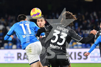 2021-12-12 - Napoli's forward Hirving Lozano jump for the ball with defender Sebastiano Luperto  - SSC NAPOLI VS EMPOLI FC - ITALIAN SERIE A - SOCCER