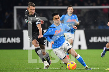 2021-12-12 - Empoli's midfielder Leo Stulac in action against Napoli's forward Adam Ounas  - SSC NAPOLI VS EMPOLI FC - ITALIAN SERIE A - SOCCER