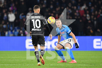2021-12-12 - Empoli's midfielder Nedim Bajrami and Napoli's defender Amir Rrahmani in action  - SSC NAPOLI VS EMPOLI FC - ITALIAN SERIE A - SOCCER