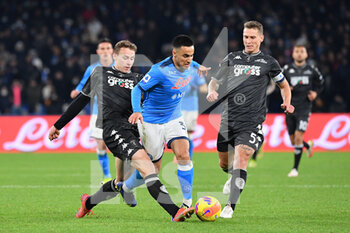 2021-12-12 - Napoli's forward Adam Ounas compete for the ball with Empoli's midfielder Szymon Zurkowski and Empoli's midfielder Leo Stulac  - SSC NAPOLI VS EMPOLI FC - ITALIAN SERIE A - SOCCER