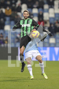 2021-12-12 - Domenico Berardi (Sassuolo) passes the ball - US SASSUOLO VS SS LAZIO - ITALIAN SERIE A - SOCCER