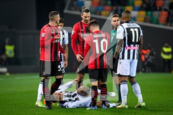 2021-12-11 - Foul of Milan's Zlatan Ibrahimovic (Milan) on Udinese's Rodrigo Nascimento Becao - UDINESE CALCIO VS AC MILAN - ITALIAN SERIE A - SOCCER