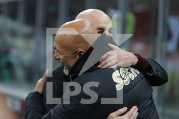2021-12-19 - Luciano Spalletti Head Coach of SSC Napoli hugs Stefano Pioli Head Coach of AC Milan during the Serie A 2021/22 football match between AC Milan and SSC Napoli at Giuseppe Meazza Stadium, Milan, Italy on December 19, 2021 - AC MILAN VS SSC NAPOLI - ITALIAN SERIE A - SOCCER